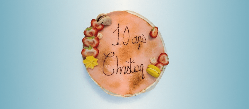 Celebration cake marking ten years of Christian Zanette with G-OPS