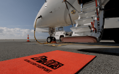G-OPS flight support team servicing a private jet on the tarmac during the G7 Summit